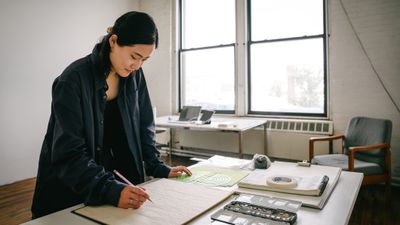 Artist Heemin Chung working on the limited BMW i7 miniature edition, presented at Frieze Seoul 2024.