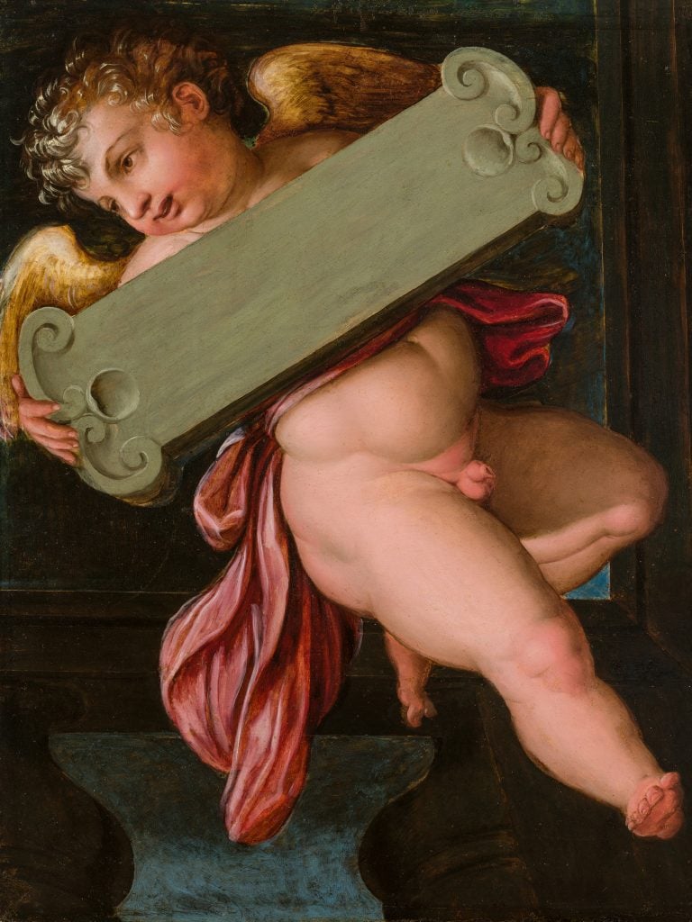 a naked cherub with a robe falling to the side holding up a panel