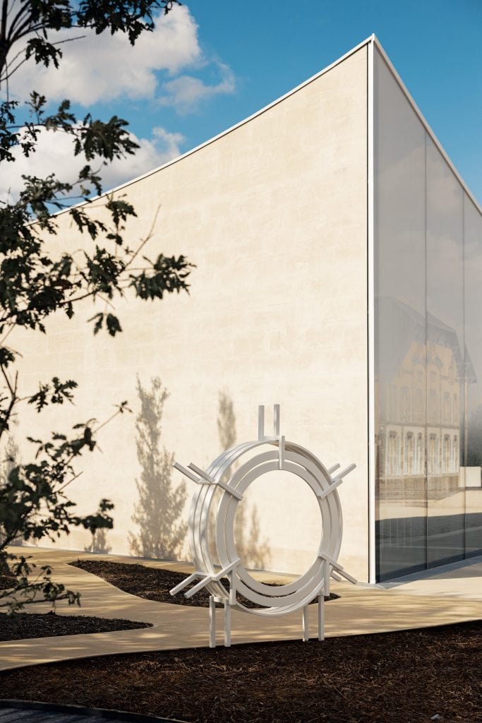 a perspective of the nicolas ruinart pavilion, displaying a circular sculpture infront of the curved stone and glass facade