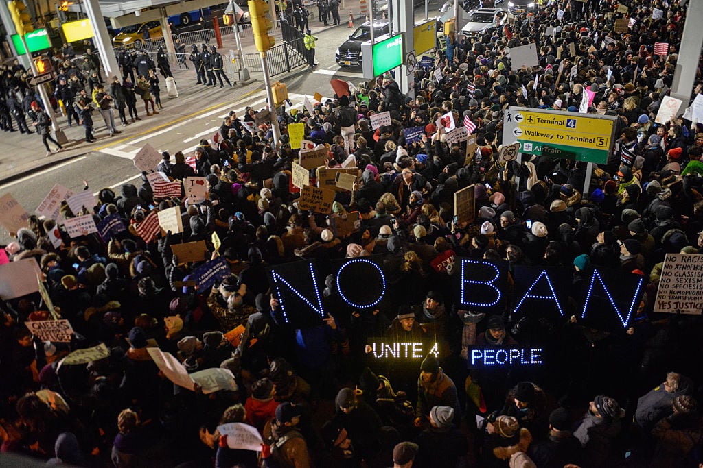 Crowds demonstrate at JFK airport in 2017.