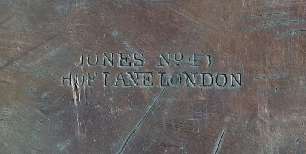 a sheet of copper embossed with the words "Jones No 413. Huf Lane London"