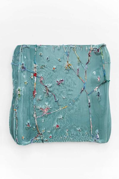 Yin Xiuzhen, Wall Instrument No. 28 (2019–2021). Porcelain, used clothes. 37-5/8" × 38-3/4" × 4-5/16".