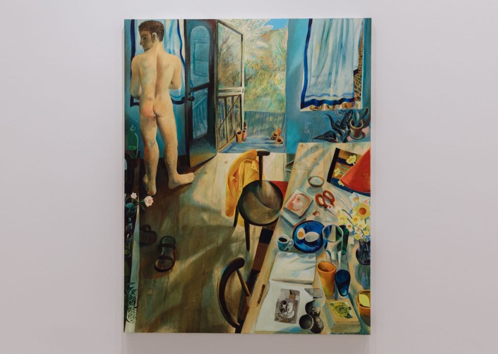 a painting in which a naked man seen from behind lingers near an open window on a balcony, there is a table in the foreground scattered with everyday items and a boiled egg 