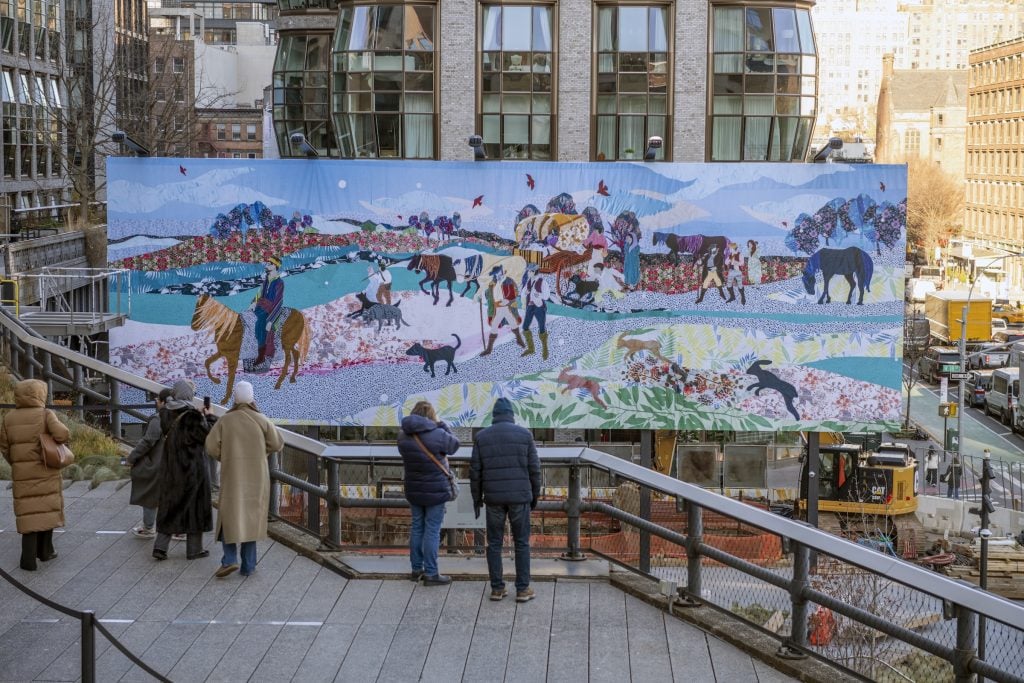 Małgorzata Mirga-Tas, Beyond the Horizon. A colorful quilted collage of a migrating Roma community, but depicted in an idealized fashion, reappropriating historical imagery that negatively stereotyped the ethnic group. It is seen on a billboard, with people standing on the High Line elevated walkway to look at it.