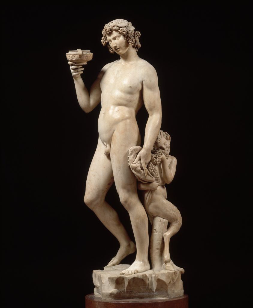 Michelangelo’s Bacchus: a dynamic marble sculpture of the Roman god of wine, holding a goblet, slightly tipsy.